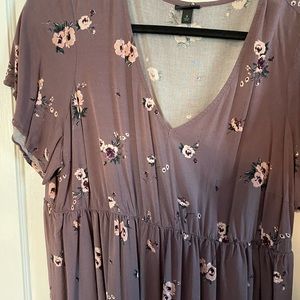 Purple v neck babydoll top with floral pattern